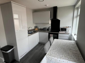 New 2 bedroom first floor apartment close to beach